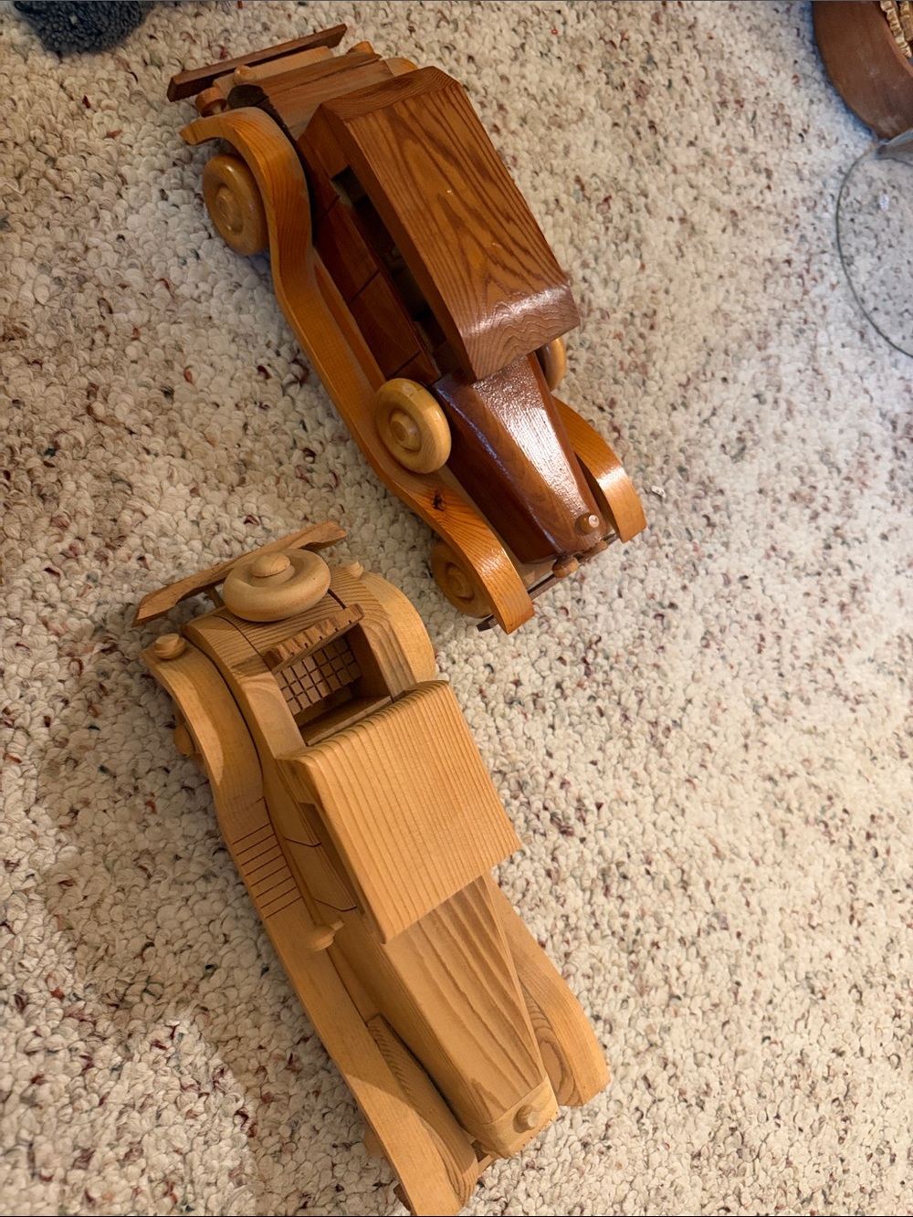 2 vintage handcrafted wooden toy cars, styled after classic 1930s roadsters